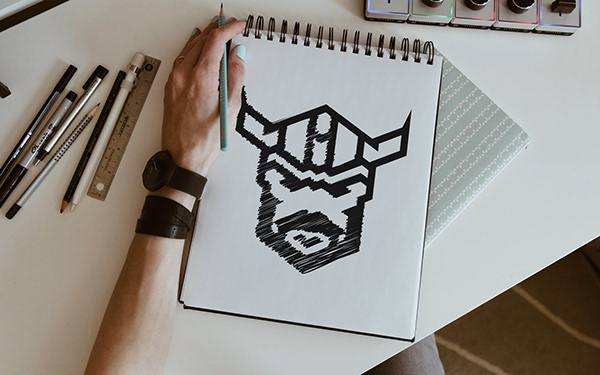 Leo Rogers sketching the Titan Designs logo